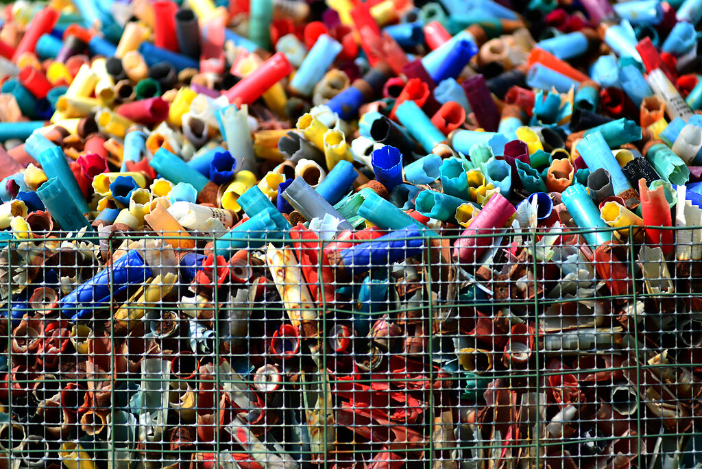 Heaps of shotgun shells collect refuse